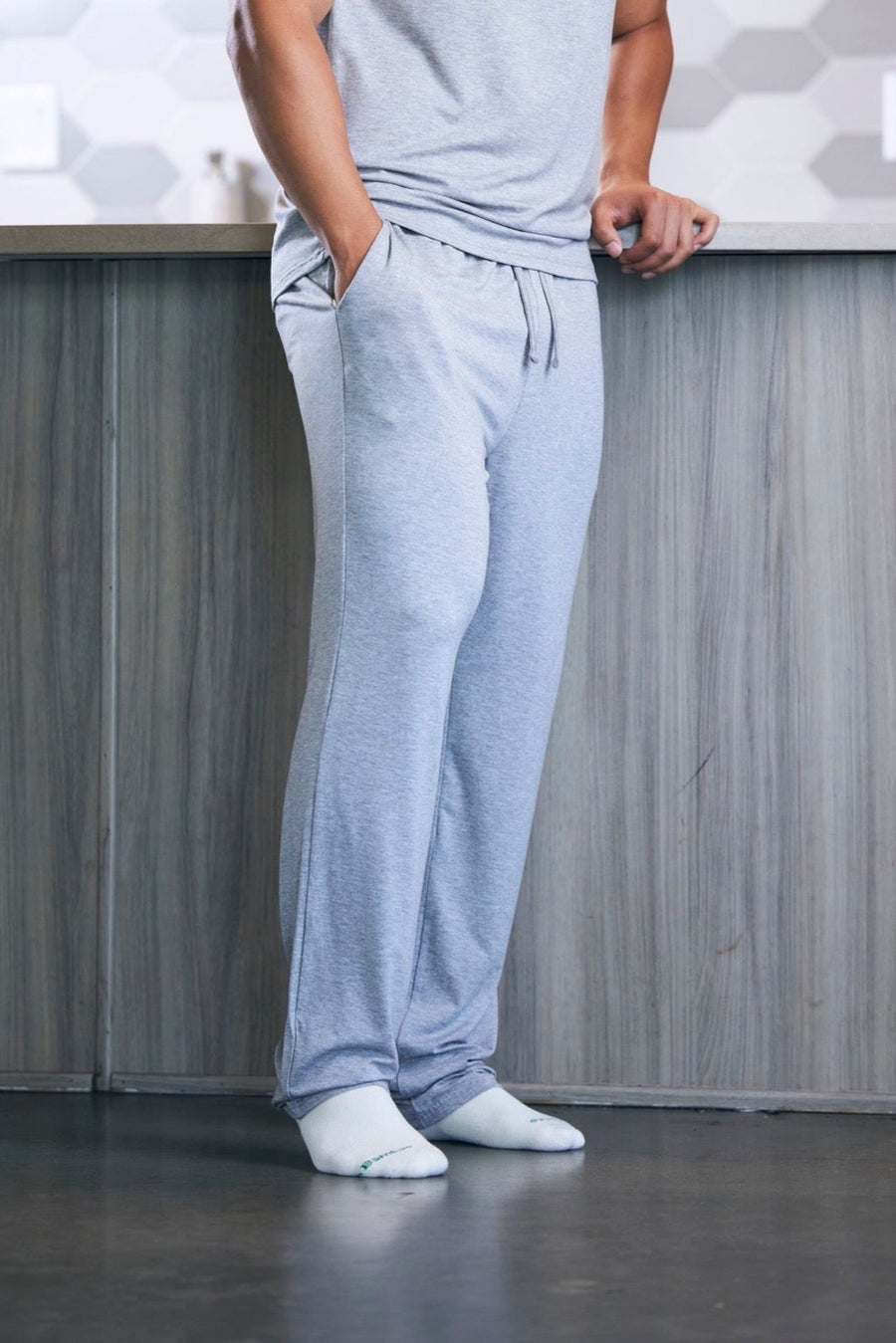 Spun Bamboo men's lounge pants in Heather Grey, full-length front view on a model; shirt and socks not included.