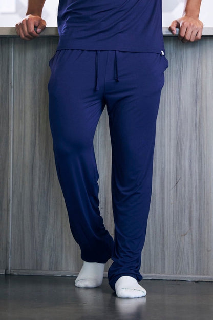 Spun Bamboo men's lounge pants in Navy Blue, full-length front view on a model; shirt and socks not included.