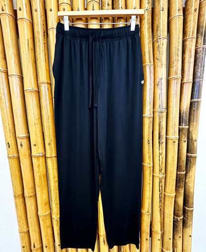Spun Bamboo men's lounge pants in Black on a hanger, showing the full front, elastic waistband and drawstring.