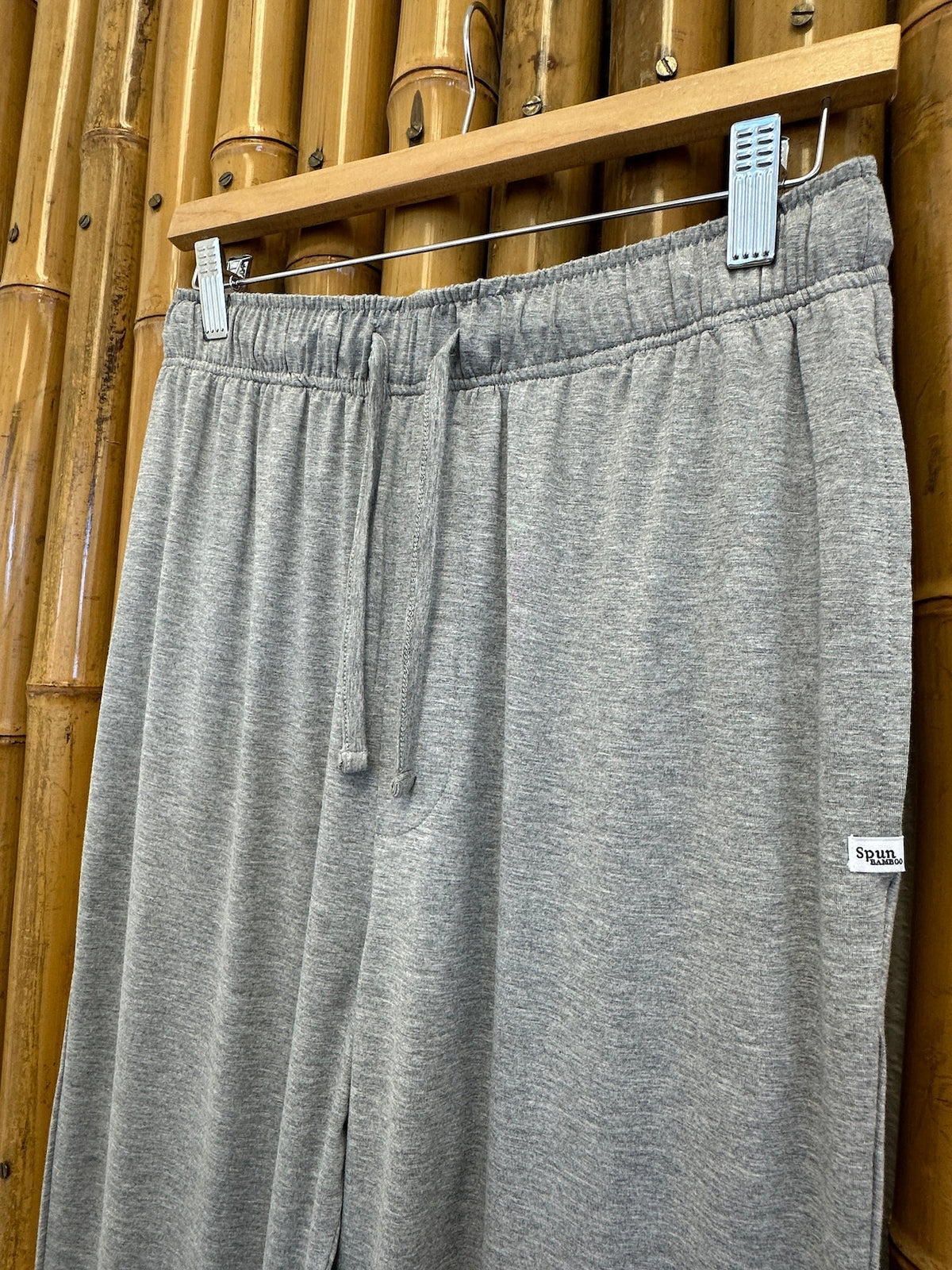 Close-up of Heather Grey Spun Bamboo lounge pants showing waistband stitching, drawstring and side seam.
