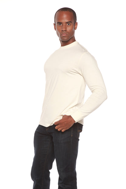 Angled view of the Spun Bamboo long-sleeve crewneck in Natural, showing the sleeves and straight hem.